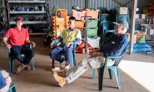 Controller engaging with farmers.