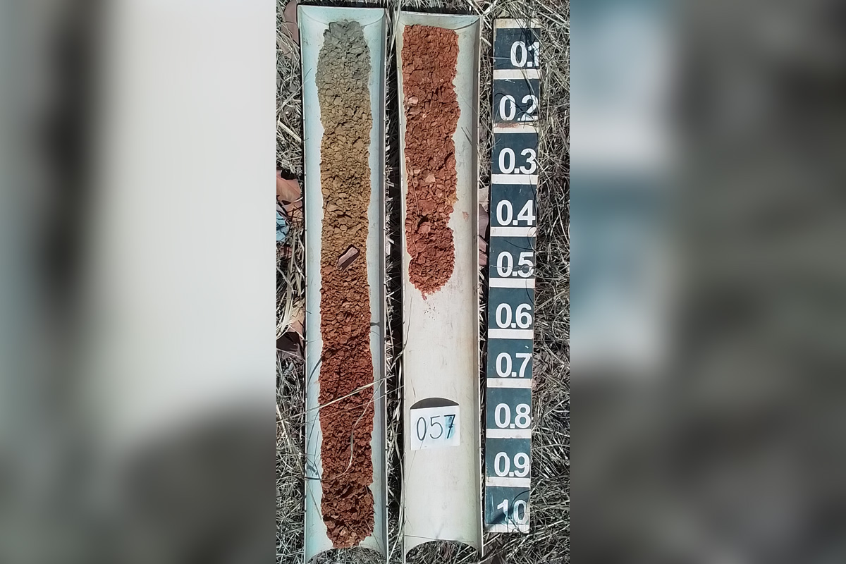 Soil samples are taken using a drill rig and the core is laid out for analysis and classification.